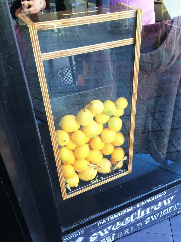 Tariku's donation box at the entrance of the cafe