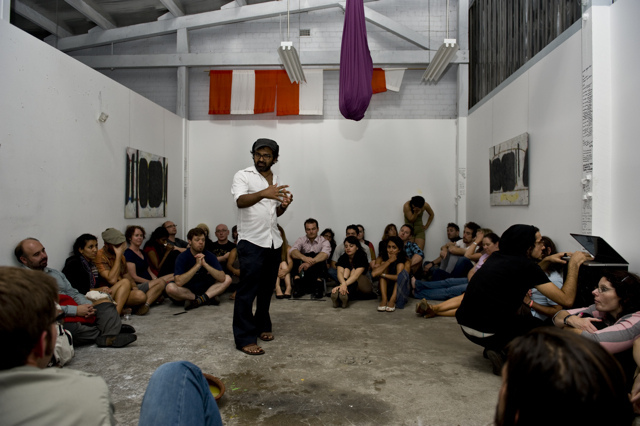Desh speaking at an arts event Gishiki 25, in February 2012 (Photo: Ondru Arts) 