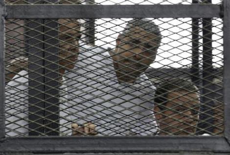 23 June 2014: Peter Greste, Mohamed Fahmy and Baher Mohamed listen to court ruling; Cairo (A. Waguih/Reuters)